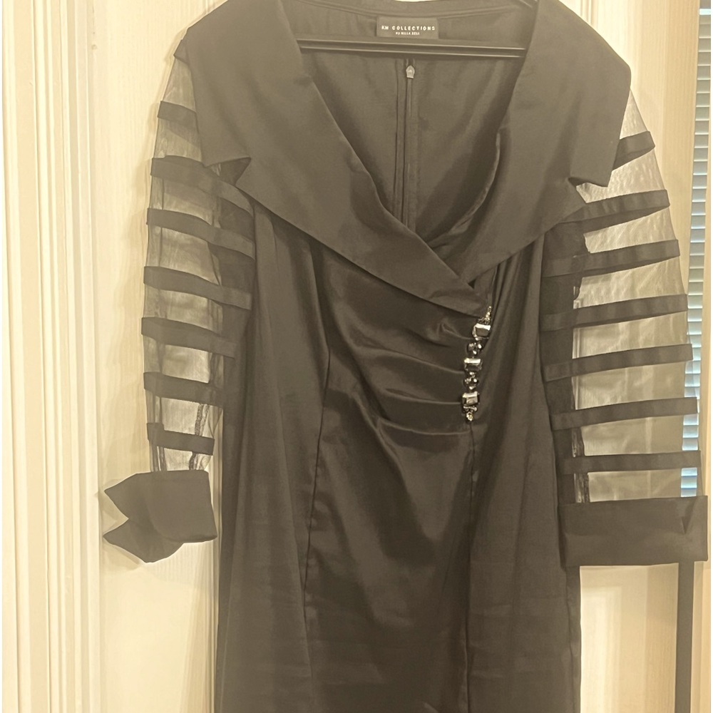 A sophisticated vintage black dress.